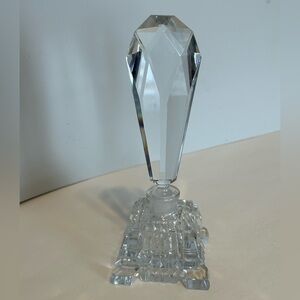 1930s vintage luxury perfume bottle square base and elongated stopper.
